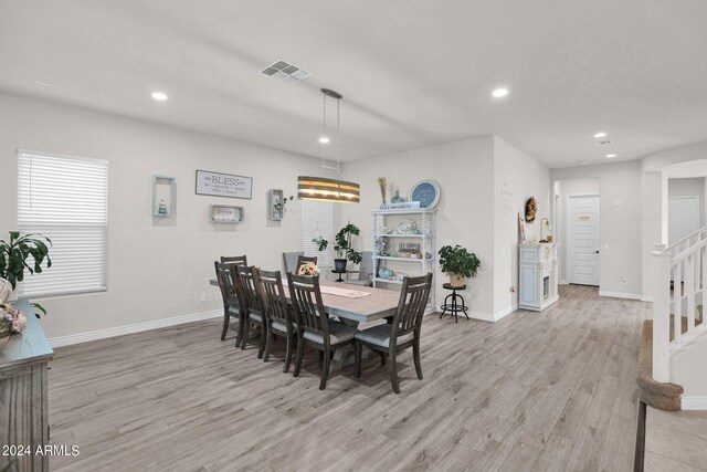 dining room with light wood-type flooring