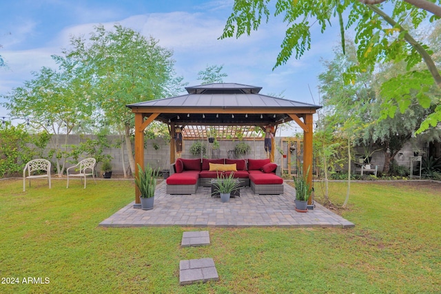 view of patio featuring an outdoor living space and a gazebo