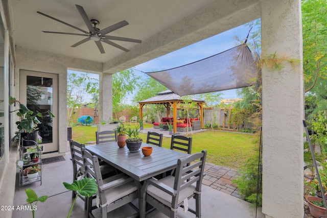 view of patio / terrace with a gazebo and ceiling fan