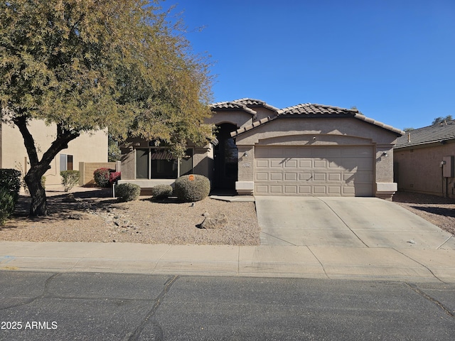 view of front of home with a garage