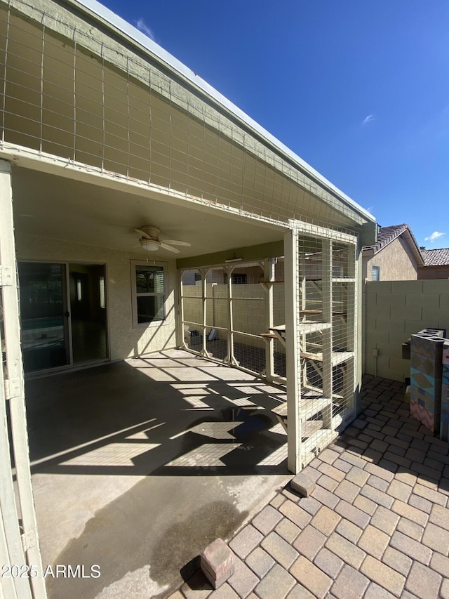 10817 W Wilshire Dr, Avondale, AZ 85392 - view of patio with fence and ceiling fan