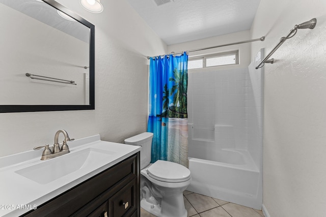10817 W Wilshire Dr, Avondale, AZ 85392 - full bathroom with visible vents, toilet, shower / bath combo with shower curtain, tile patterned floors, and vanity