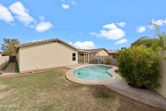 10817 W Wilshire Dr, Avondale, AZ 85392 - view of pool with a fenced in pool, a lawn, a fenced backyard, and a patio area