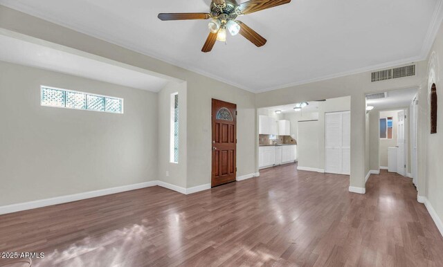 602 E San Juan Ave, Phoenix, AZ 85012 - entryway with hardwood / wood-style floors, ceiling fan, and ornamental molding
