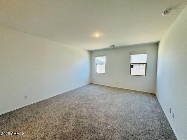 47267 W Mellen Ln, Maricopa, AZ 85139 - unfurnished room with carpet flooring, a smoke detector, and baseboards