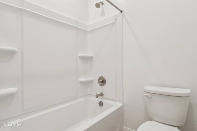 47267 W Mellen Ln, Maricopa, AZ 85139 - bathroom featuring toilet, tub / shower combination, and baseboards