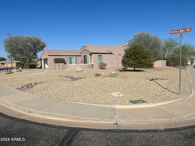 view of front of property featuring a garage