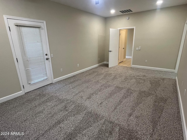 spare room with light colored carpet