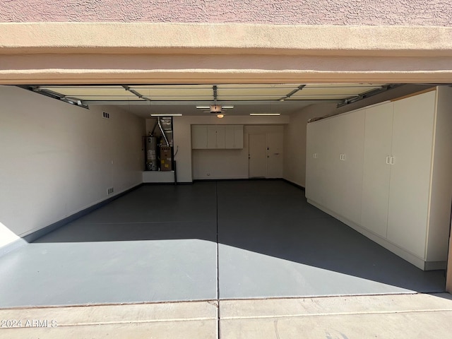 garage featuring water heater