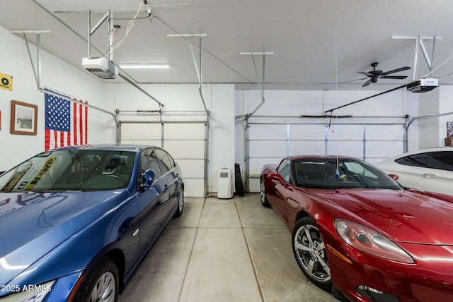 garage with a garage door opener and ceiling fan