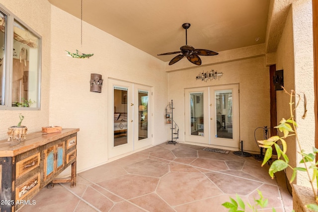 view of patio with a ceiling fan and french doors