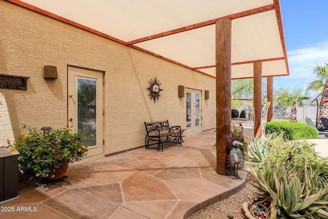 view of patio featuring french doors