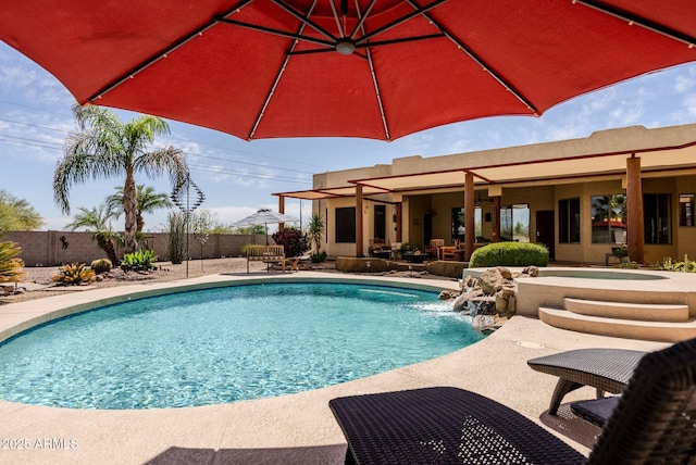 view of pool with a fenced in pool, a fenced backyard, and a patio area