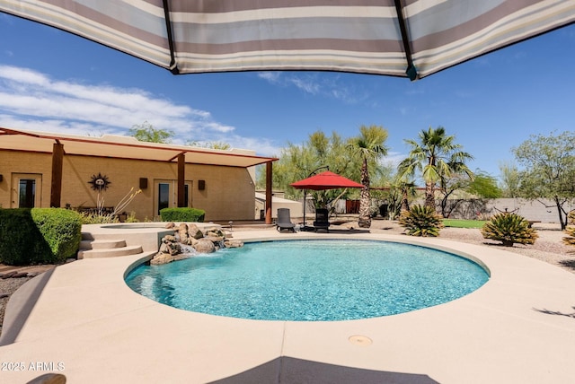 view of swimming pool with a fenced in pool, a patio area, and fence