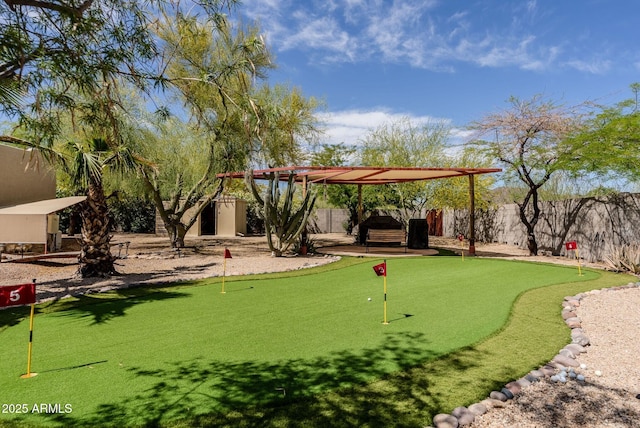 surrounding community featuring a fenced backyard