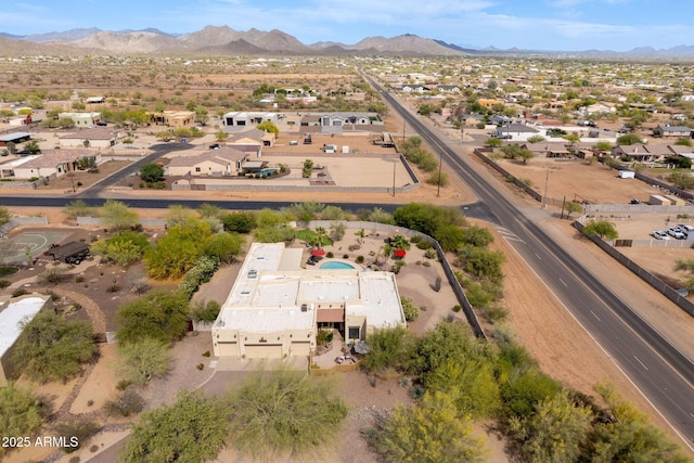 drone / aerial view with a residential view and a mountain view