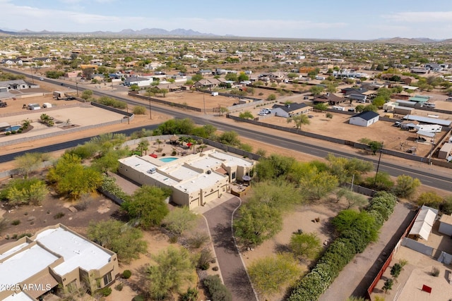 birds eye view of property featuring a mountain view and a residential view