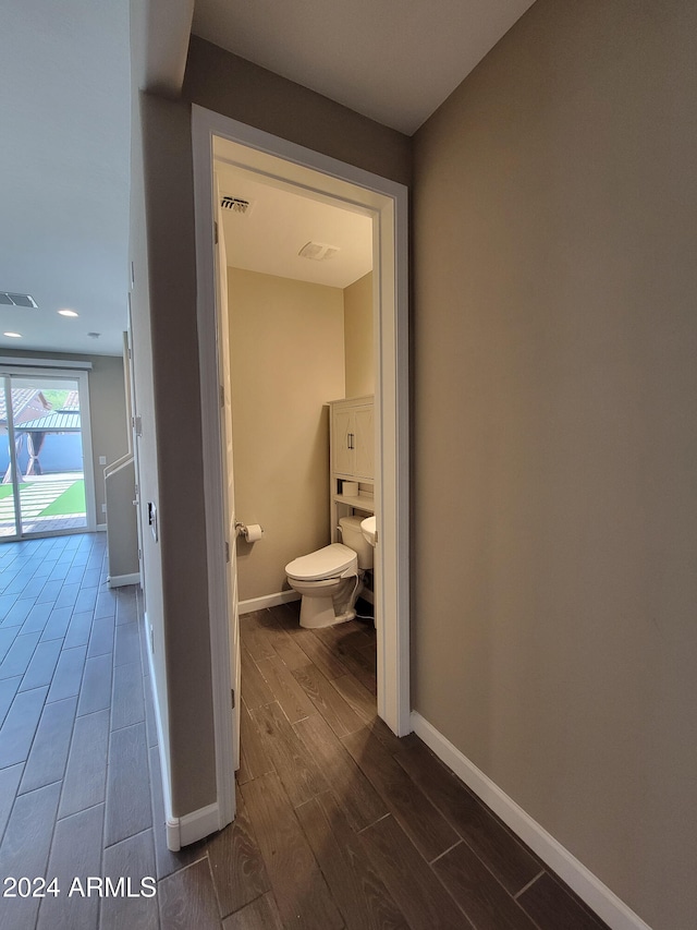 hallway featuring hardwood / wood-style floors