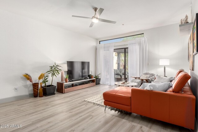10863 N 117th Pl, Scottsdale, AZ 85259 - living room with wood finished floors and a ceiling fan