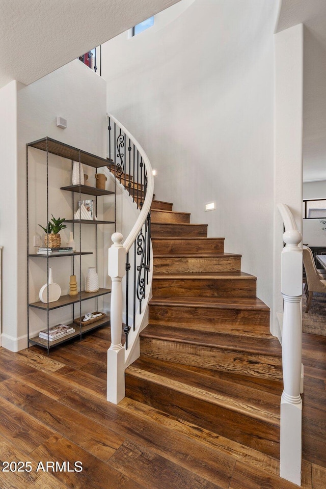 9904 E S Bend Dr, Scottsdale, AZ 85255 - staircase featuring wood finished floors