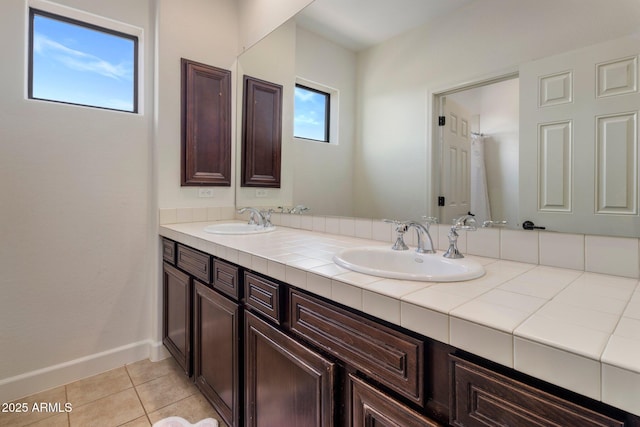 9904 E S Bend Dr, Scottsdale, AZ 85255 - full bathroom with double vanity, tile patterned floors, and baseboards