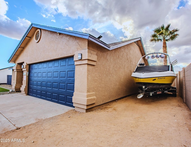 view of property exterior with a garage