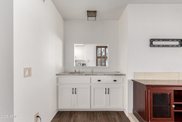 bathroom with wood-type flooring and vanity