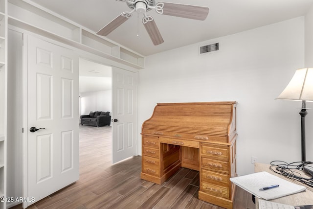 office area featuring dark hardwood / wood-style flooring and ceiling fan