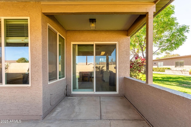 view of patio / terrace with a balcony