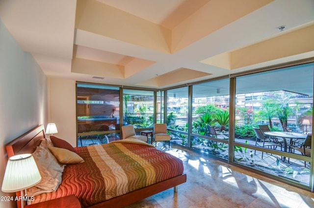 bedroom with a wall of windows