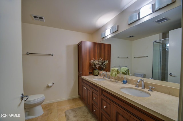 bathroom featuring walk in shower, tile patterned floors, vanity, and toilet