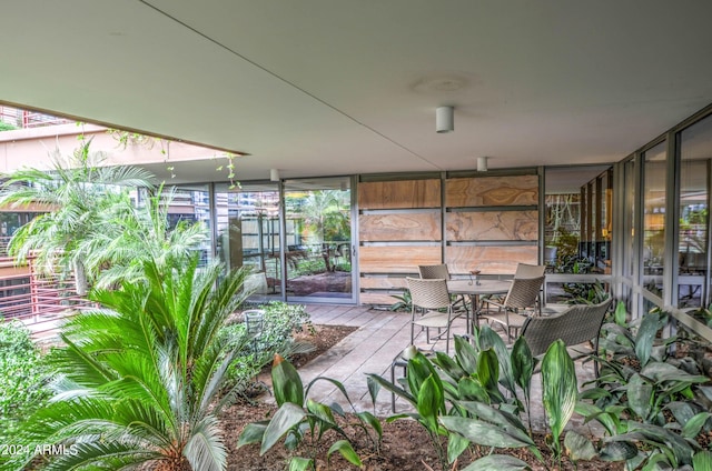 unfurnished sunroom featuring a healthy amount of sunlight