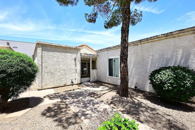 15801 N 29th St N Unit 20, Phoenix, AZ 85032 - view of front of house featuring a patio area and stucco siding