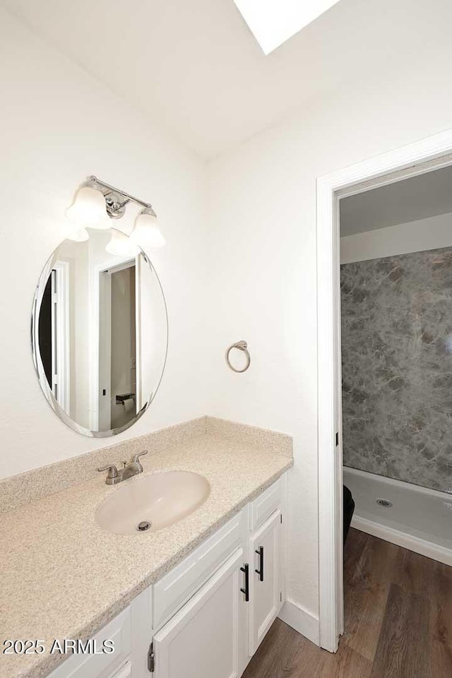 15801 N 29th St N Unit 20, Phoenix, AZ 85032 - bathroom with vanity, wood finished floors, and a shower