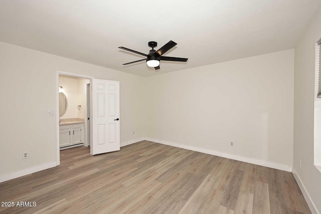 15801 N 29th St N Unit 20, Phoenix, AZ 85032 - unfurnished bedroom with light wood finished floors and baseboards