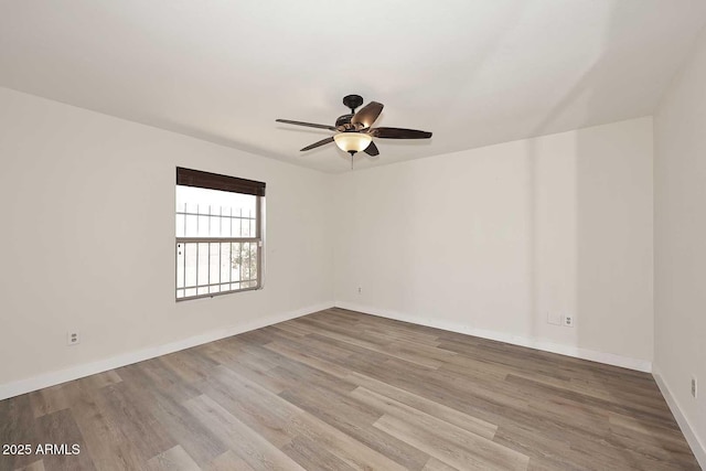 15801 N 29th St N Unit 20, Phoenix, AZ 85032 - unfurnished room featuring ceiling fan, wood finished floors, and baseboards