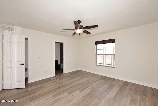15801 N 29th St N Unit 20, Phoenix, AZ 85032 - unfurnished room with ceiling fan, wood finished floors, and baseboards