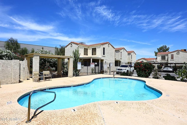 15801 N 29th St N Unit 20, Phoenix, AZ 85032 - community pool featuring a residential view and a patio area