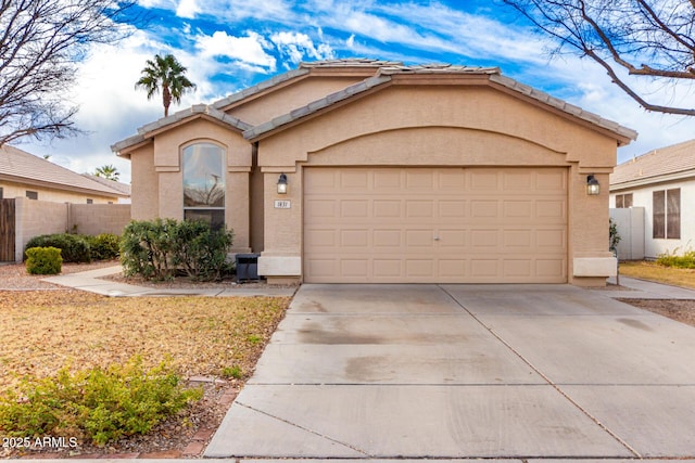 front of property with a garage