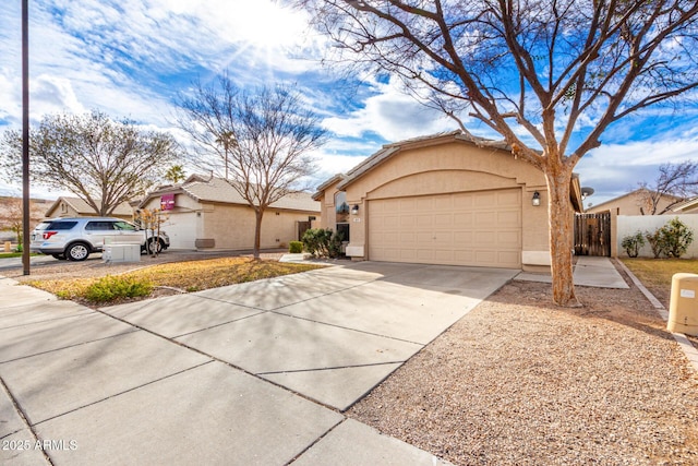 ranch-style house featuring a garage