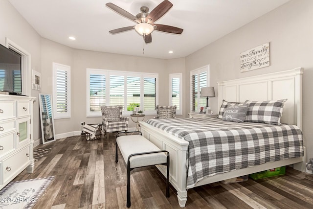 bedroom featuring ceiling fan and dark hardwood / wood-style flooring