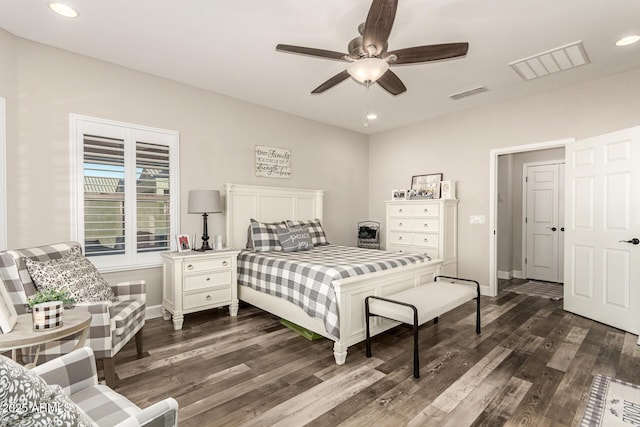 bedroom featuring ceiling fan and dark hardwood / wood-style floors