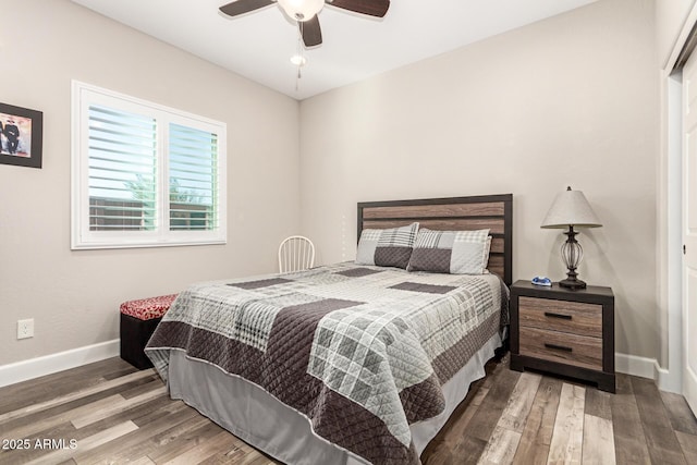 bedroom featuring hardwood / wood-style flooring and ceiling fan