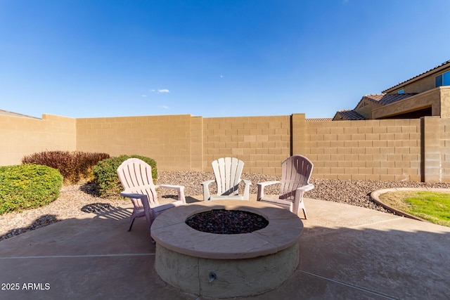 view of patio featuring a fire pit