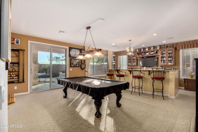 game room featuring light carpet, pool table, and bar area