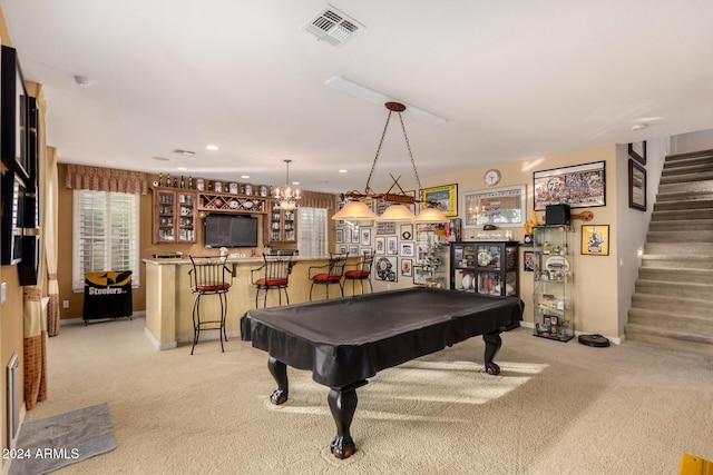 playroom featuring light carpet, bar, and pool table