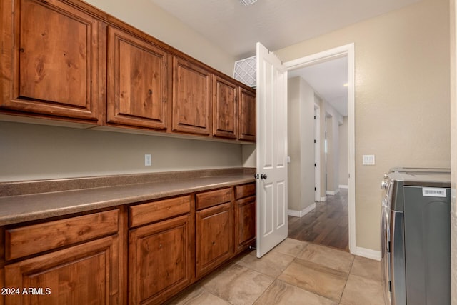 kitchen featuring washing machine and dryer