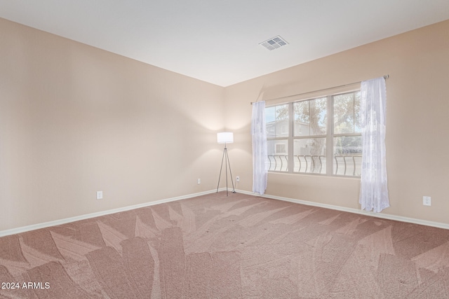 unfurnished room with carpet floors