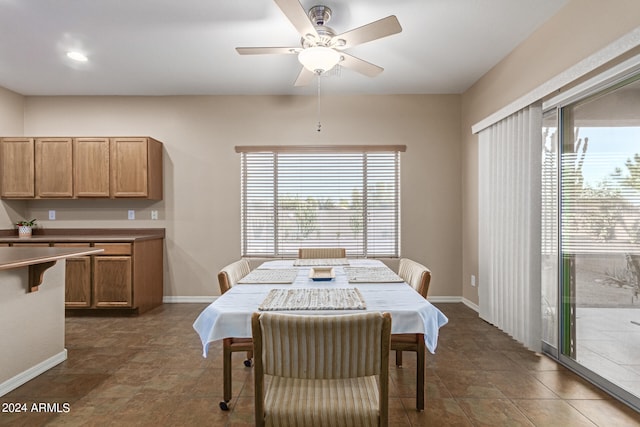 dining room featuring ceiling fan