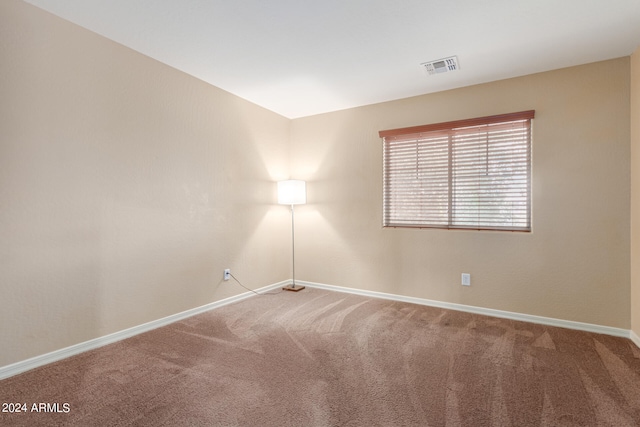 unfurnished room with carpet floors